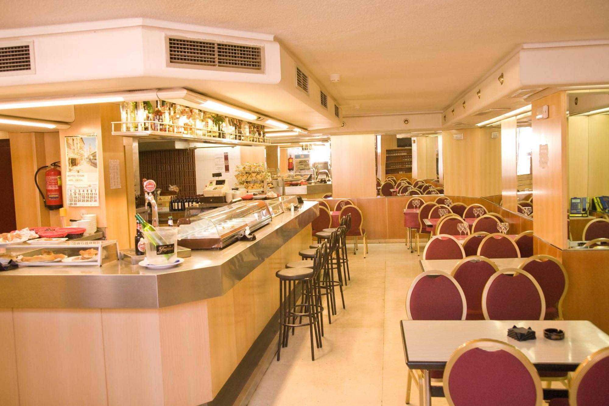 缇布尔酒店 萨拉戈萨 餐厅 照片